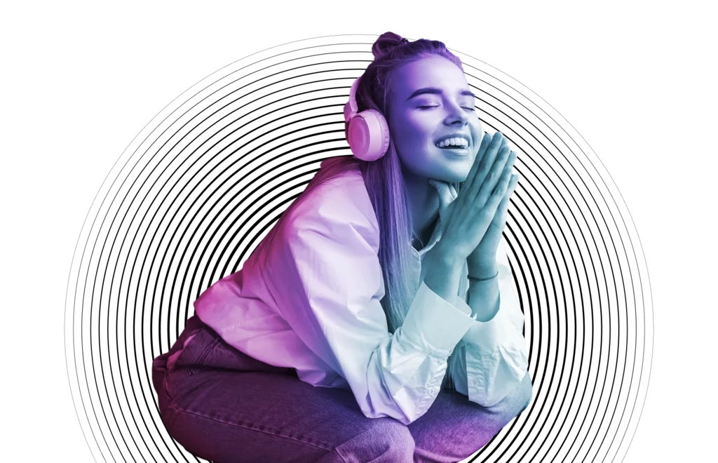 Woman smiling wearing headphones holding hands in a prayer position